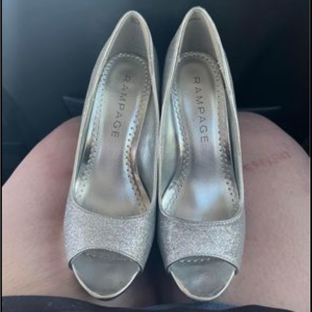 Size 6 1/2 sparkly high heels beautiful never been worn asking price is 20